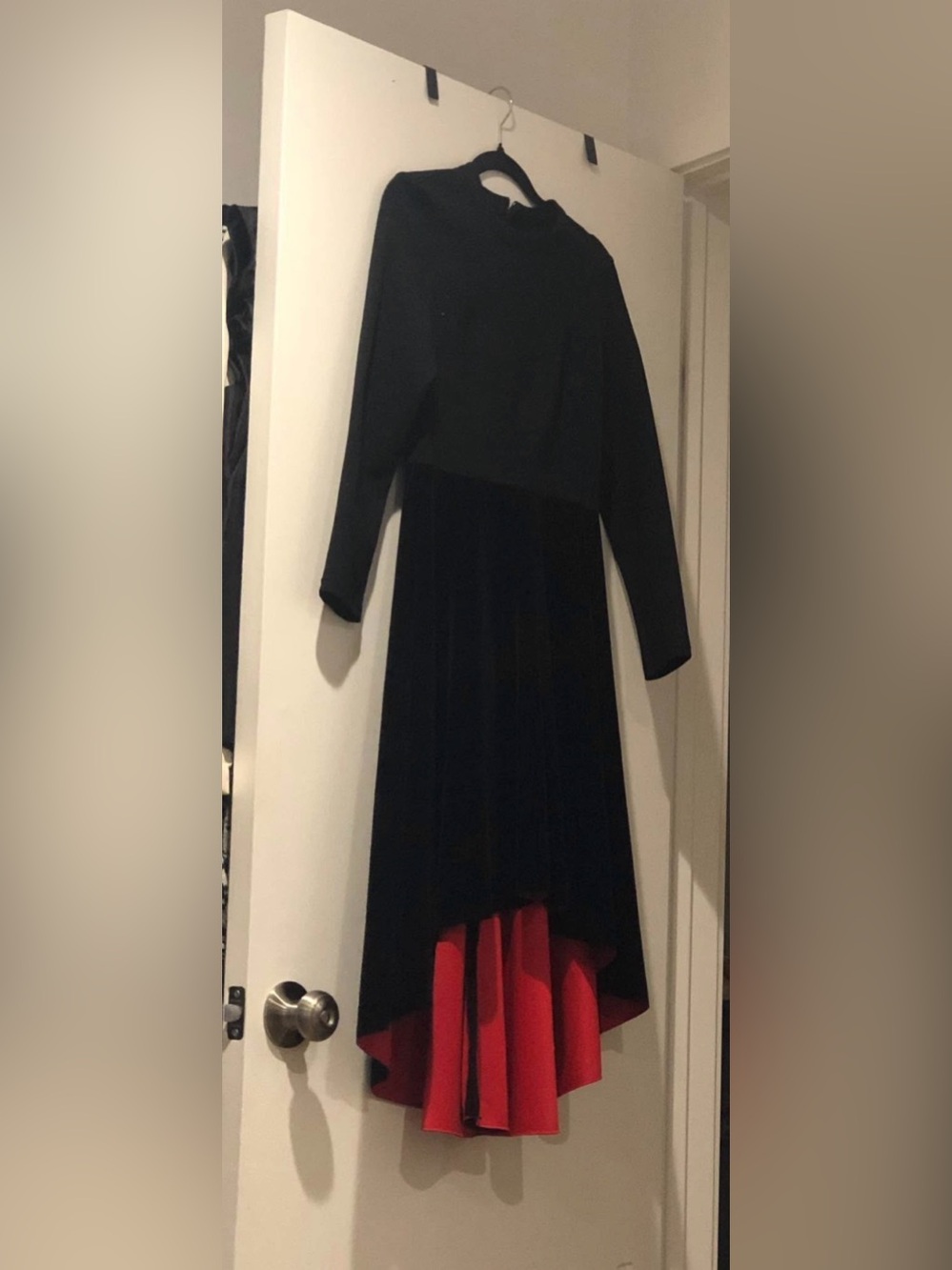 Elegant Black Long-Sleeve Midi Dress with Red Accent